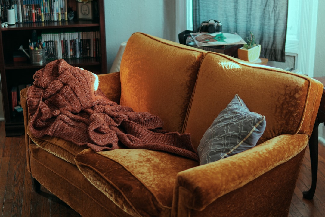 layered blankets on sofa
