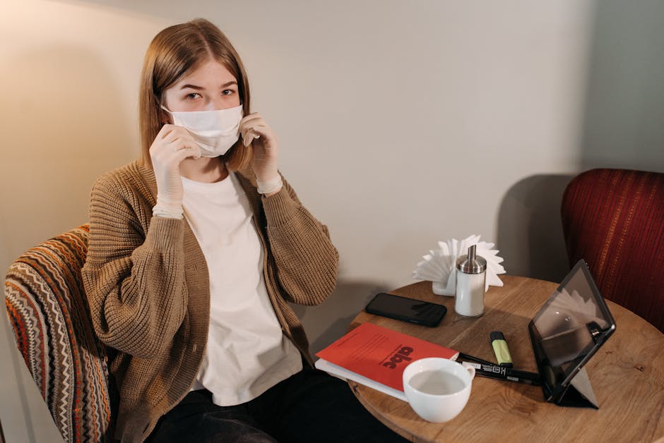 woman reading book phone away cozy