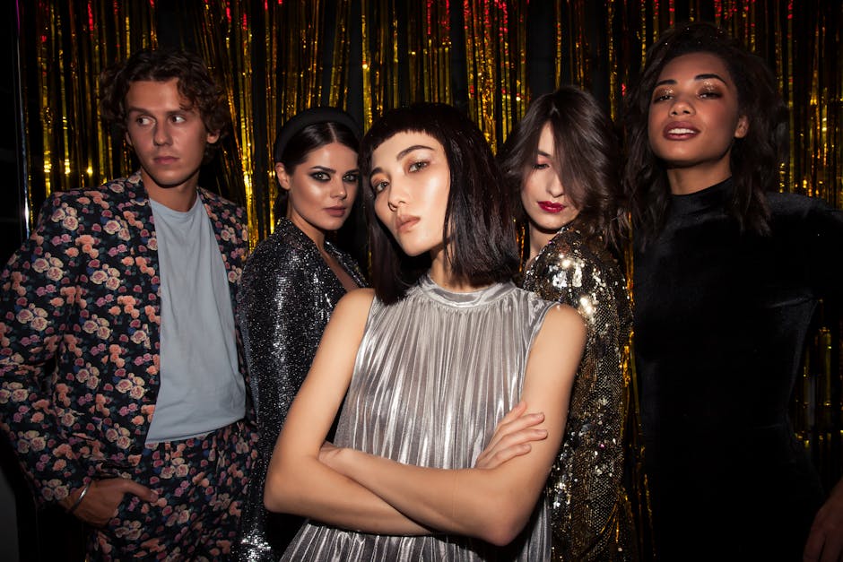 woman confidently posing in glitter dress