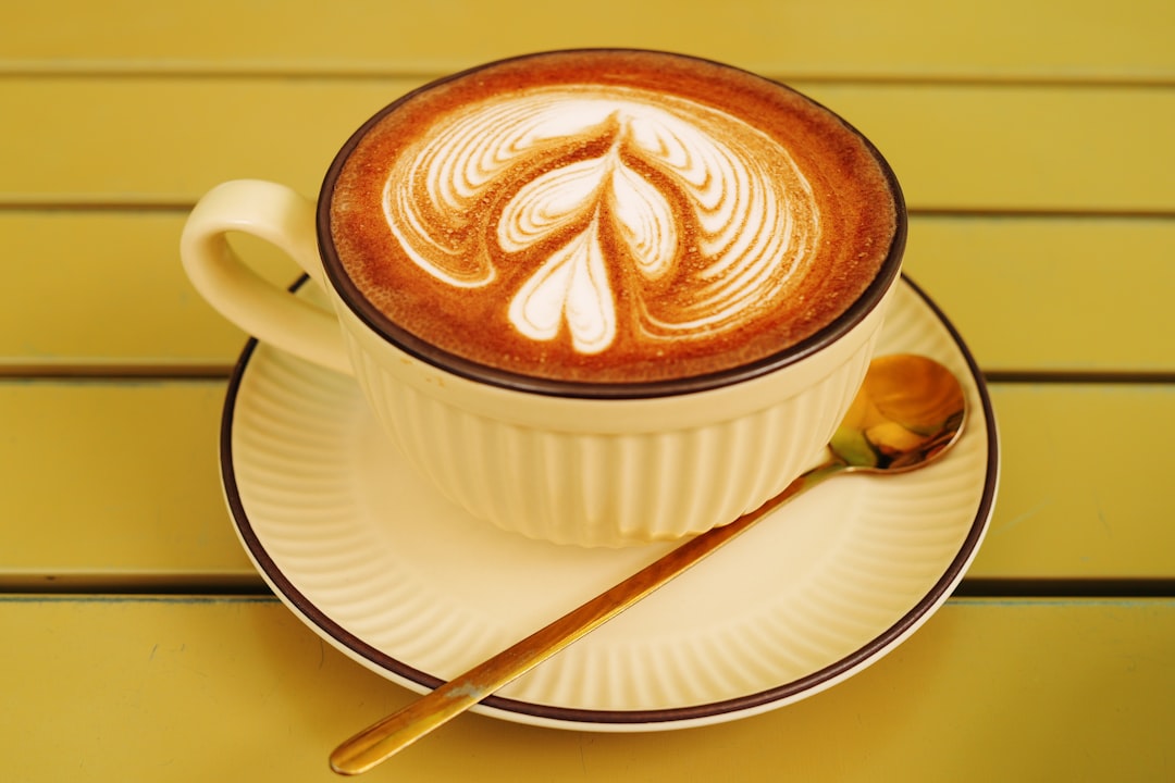 A stylish turmeric latte with cinnamon stick