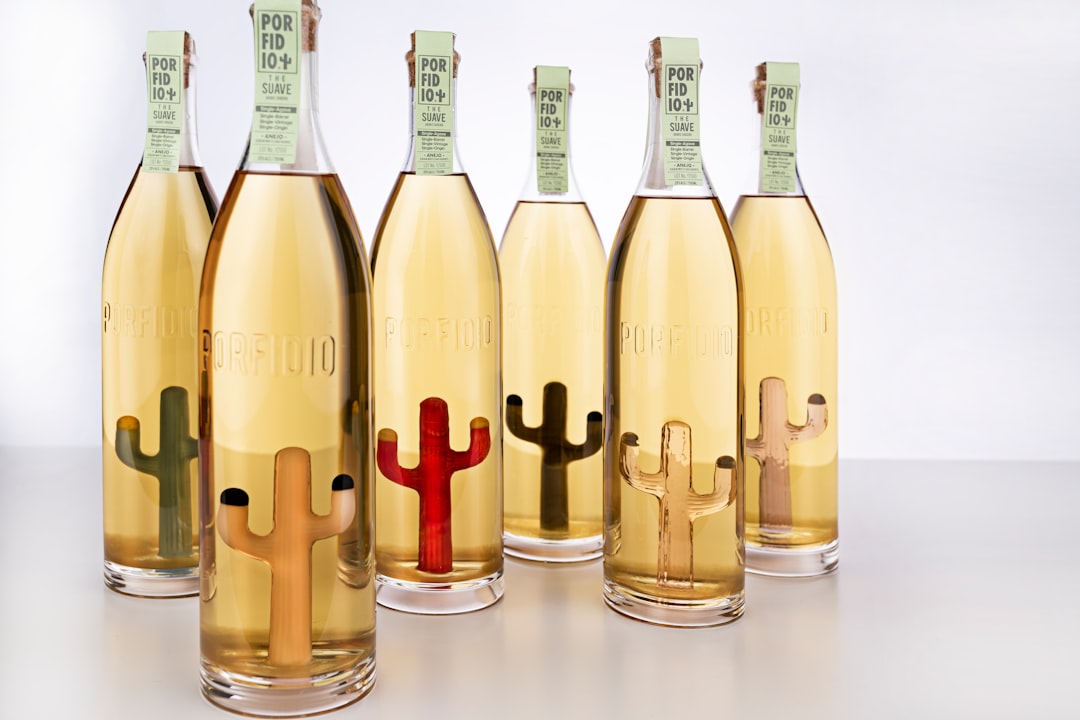 Assortment of essential oil bottles with winter botanicals Assortment of essential oil bottles with winter botanicals