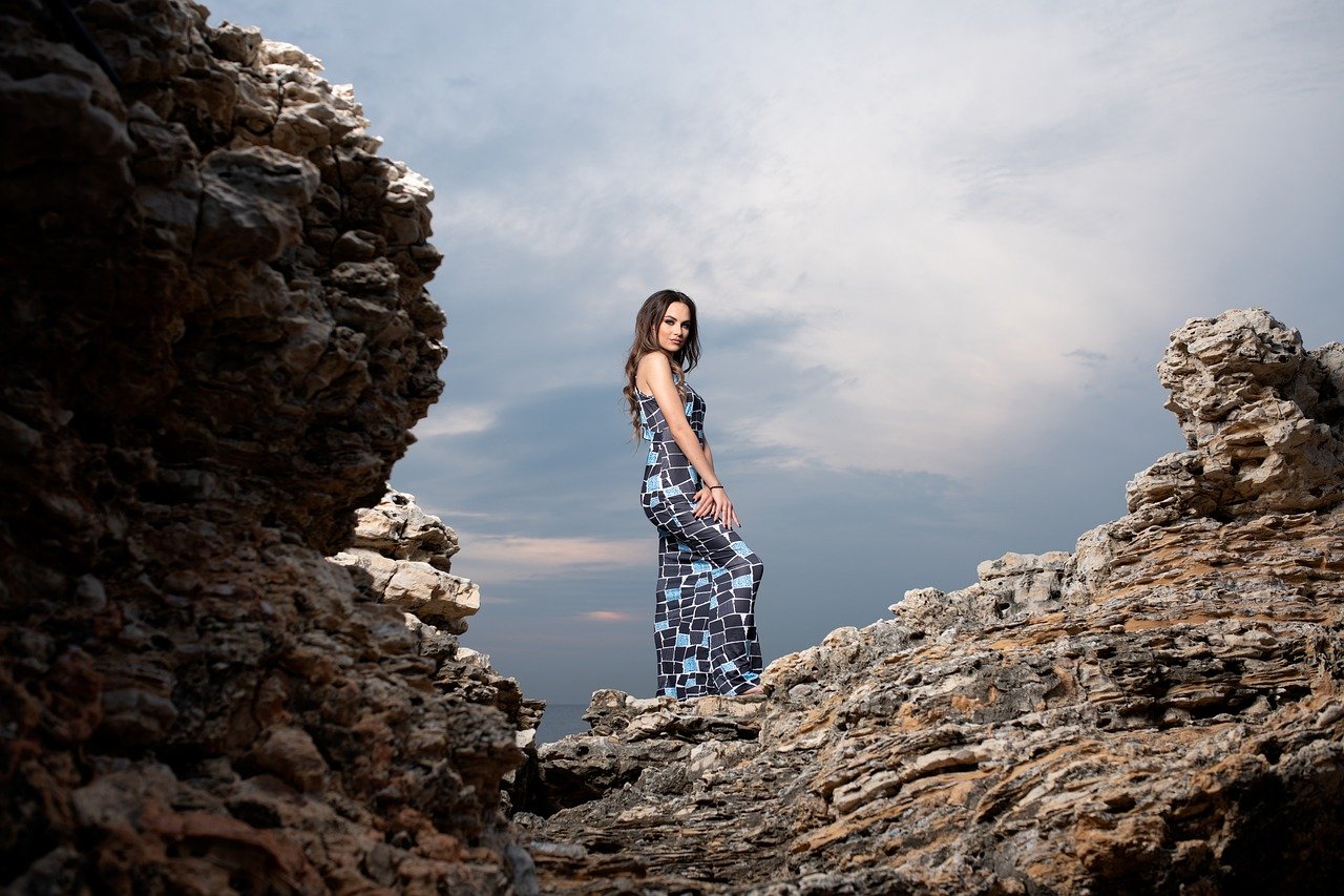 Emerald velvet slip dress layered over turtleneck