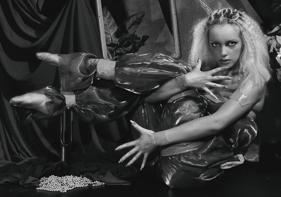 Woman accessorizing a neutral outfit