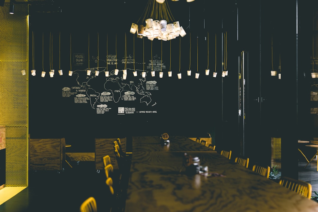 Cozy restaurant interior with warm lighting Cozy restaurant interior with warm lighting