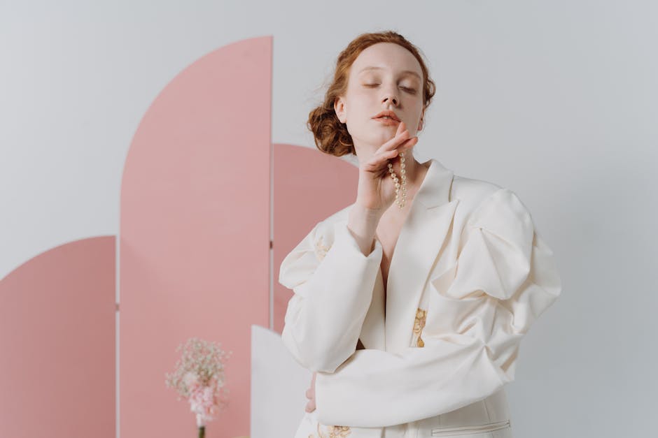 Runway model in dusty rose outfit